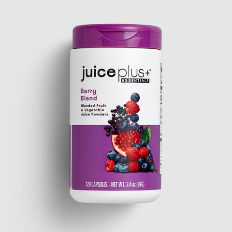 Juice Plus+ Essentials Berry Blend supplement container on a light gray background